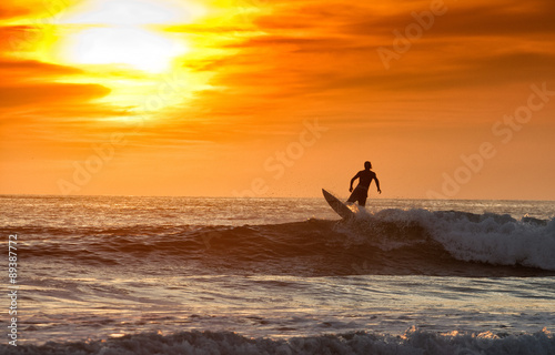 Surfing at Sunset © sjessup