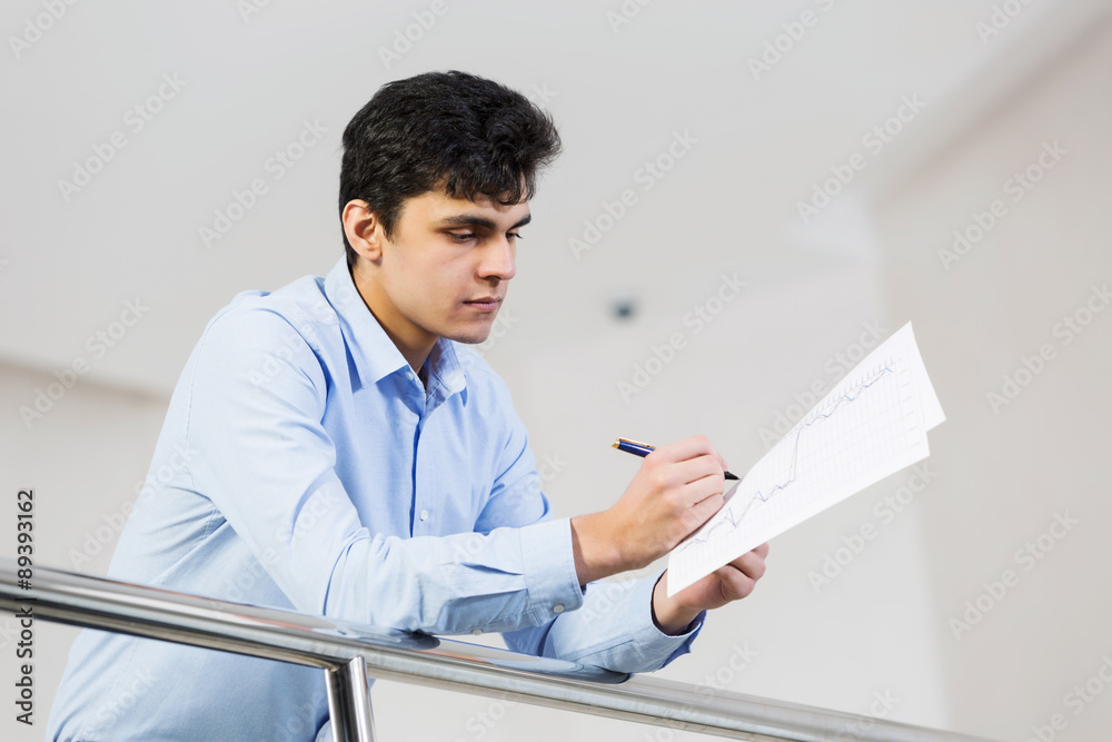 Man making notes Man making notes