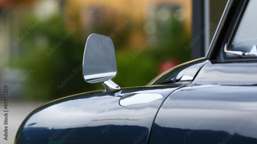 Rear view mirror of a classic car