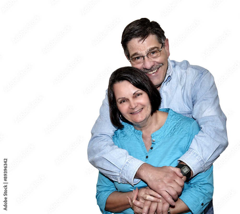 Man and Woman, senior couple embracing while smiling isolated on white Man and Woman, senior couple embracing while smiling isolated on white