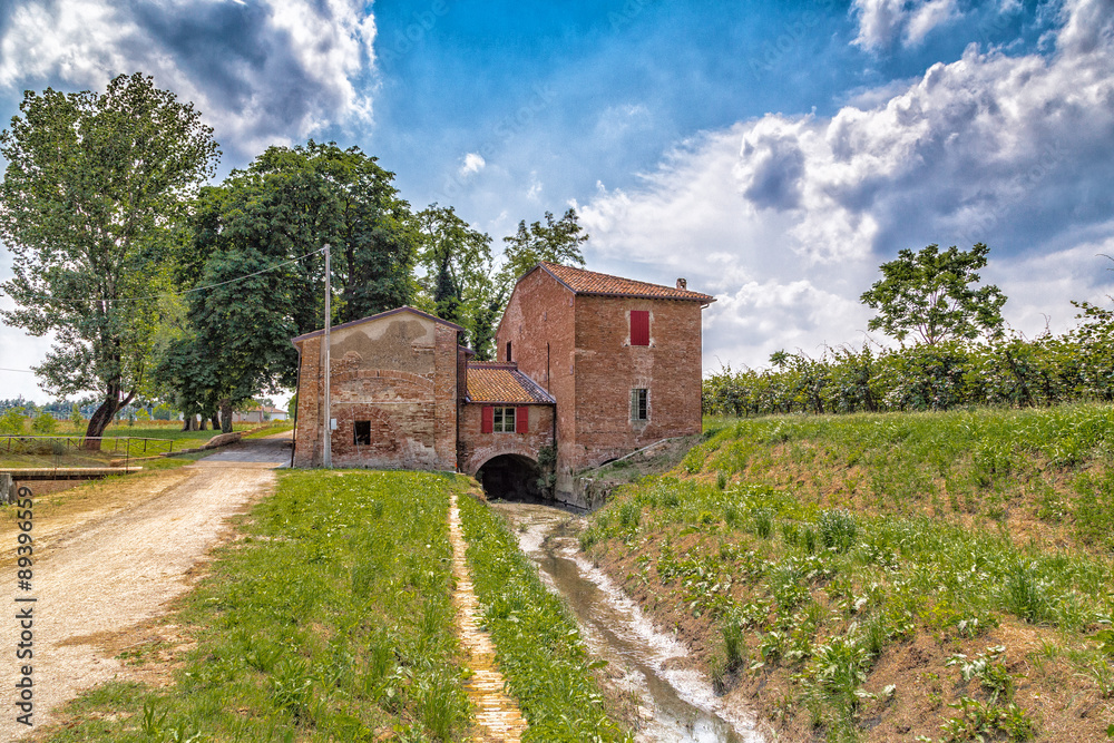 Country mill along dry river Country mill along dry river