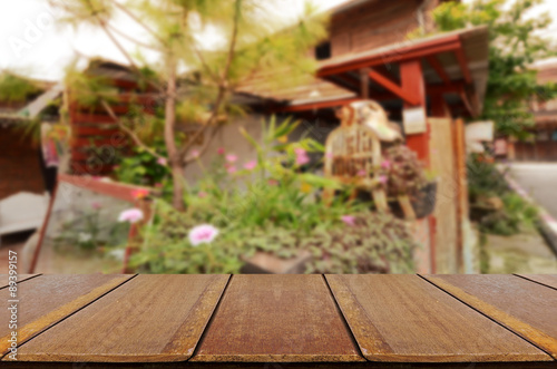 Blurred vintage backyard garden background with perspective wood
