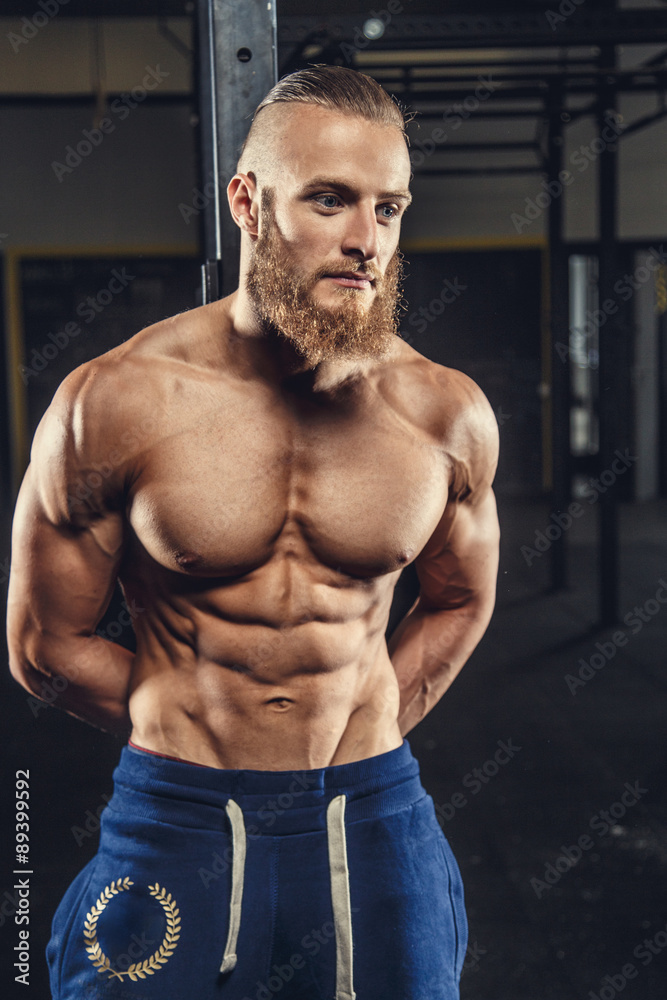Shirtless muscular man with beard. Shirtless muscular man with beard.