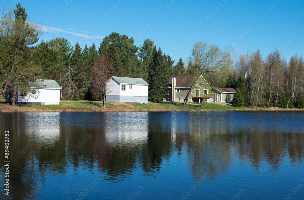 Obraz premium Canada,Quebec, St Alexis Des Montes, a farm on the St Alexis lake