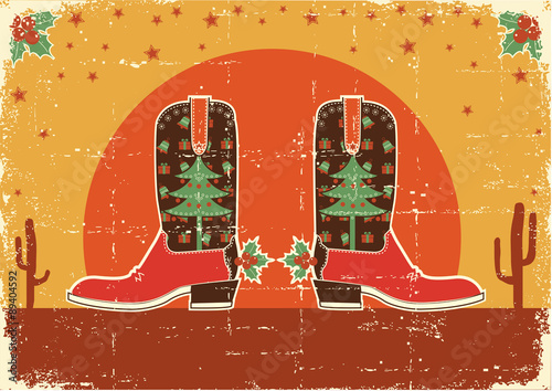Vintage cowboy christmas card with boots and holiday decoration