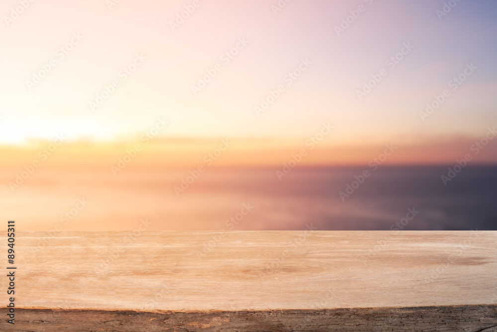 empty wood table for product display with sea and colorful sky