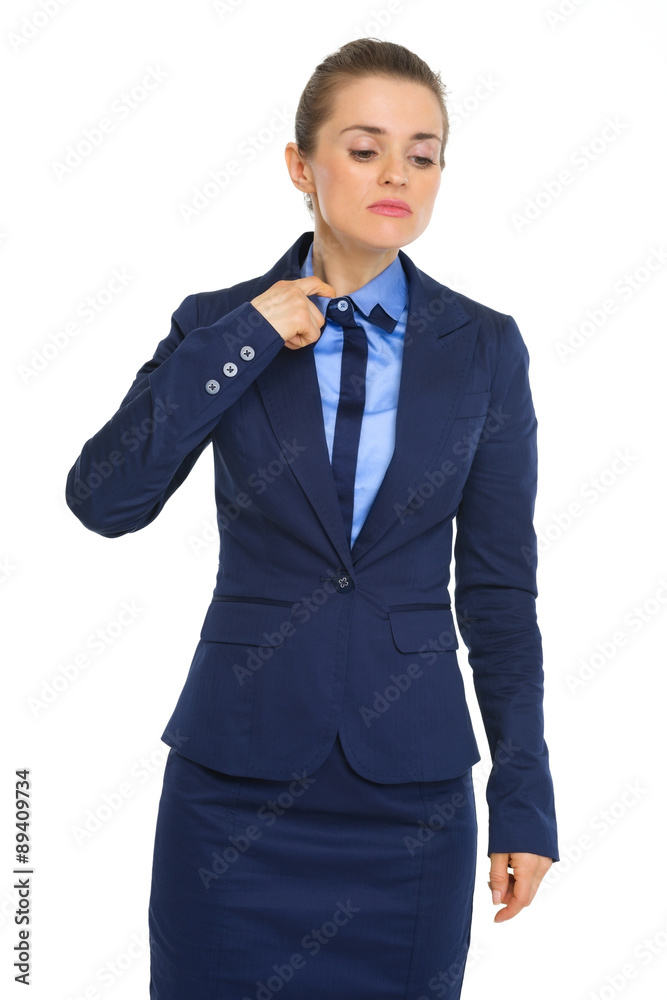 Businesswoman feeling hot under the collar and stressed Businesswoman feeling hot under the collar and stressed
