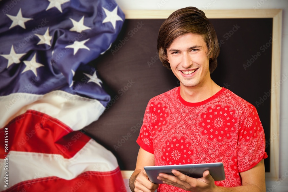 Composite image of smiling student with tablet Composite image of smiling student with tablet