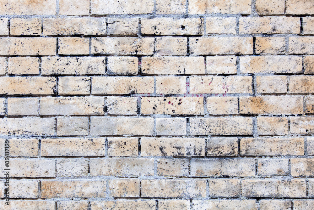 Weathered dirty brick wall background