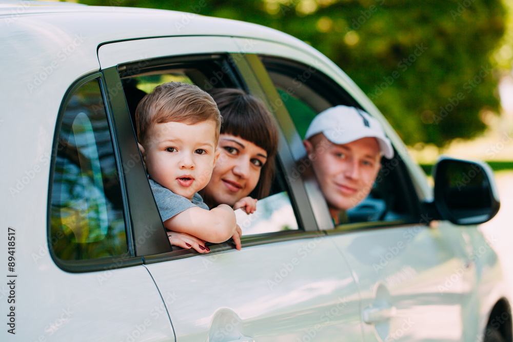 Happy family at the new car. Automobile.