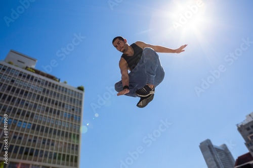  Man doing parkour in the city