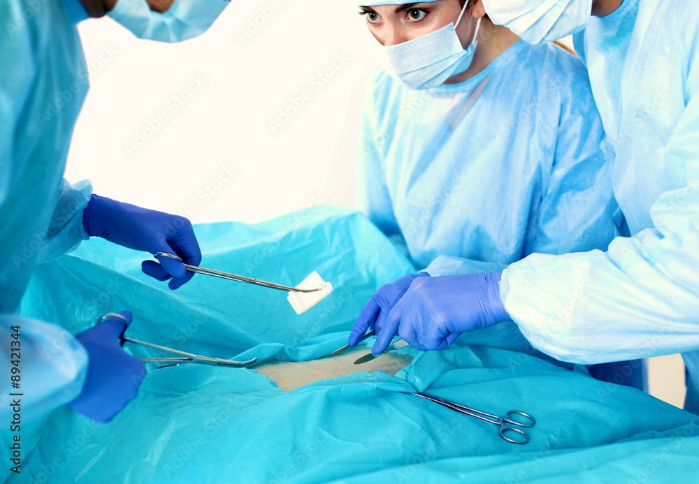 Team surgeon at work in operating room Team surgeon at work in operating room