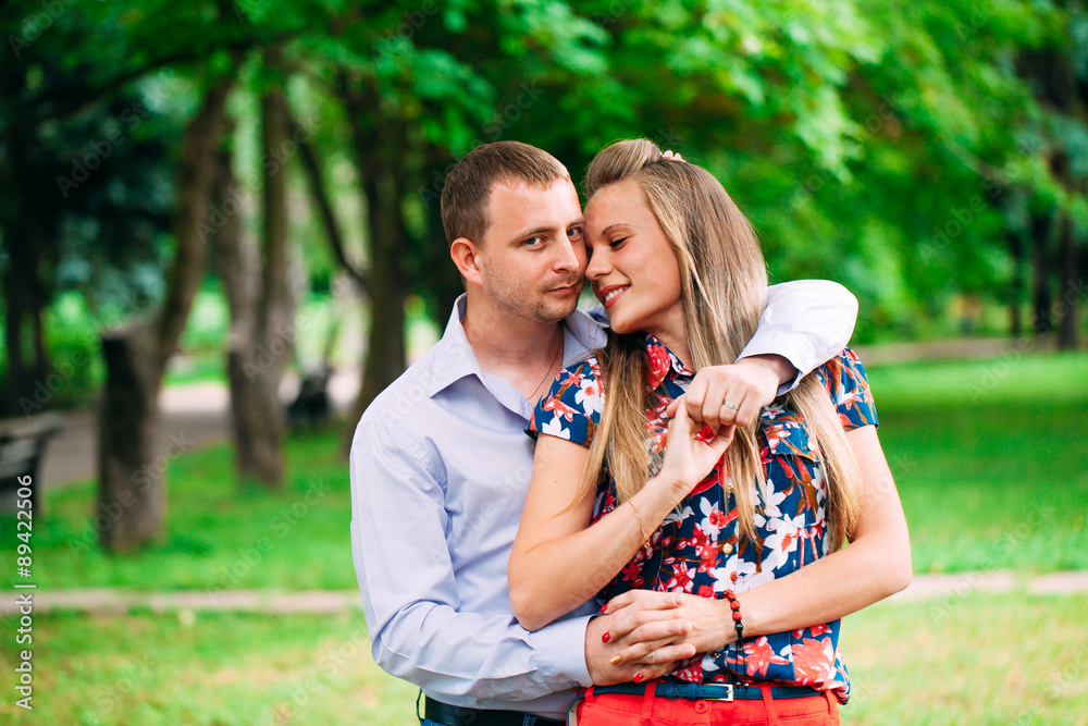 Fototapeta premium Happy young couple in love. Park outdoors.
