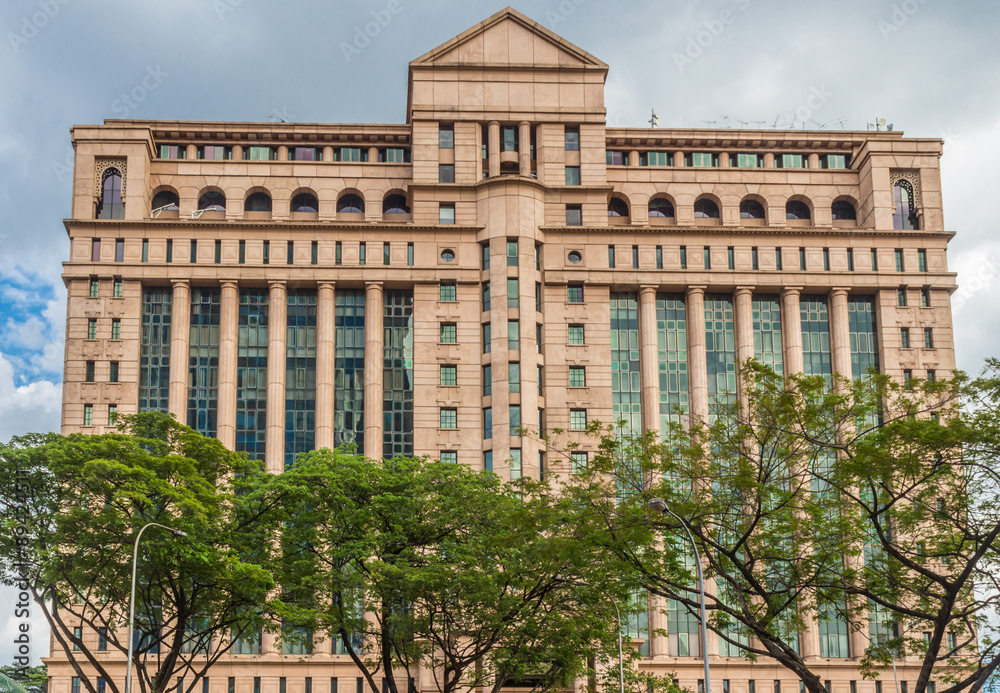 modern building and trees in the city centre of Kuala Lumpur