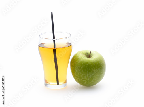 Apple juice in glass on white background
