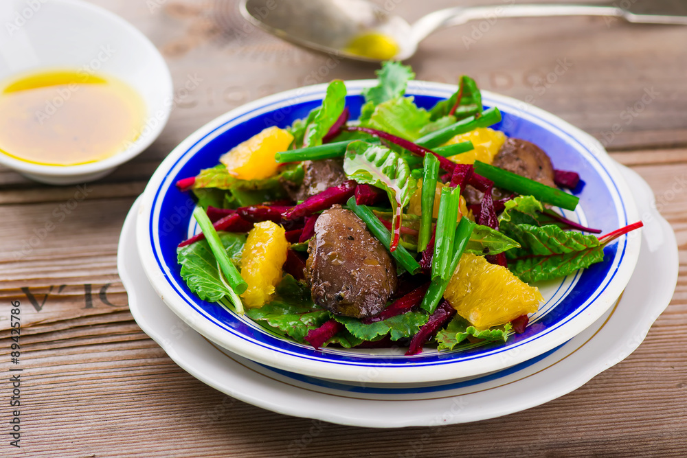 salad with beet and a chicken liver on salad with beet and a chicken liver on