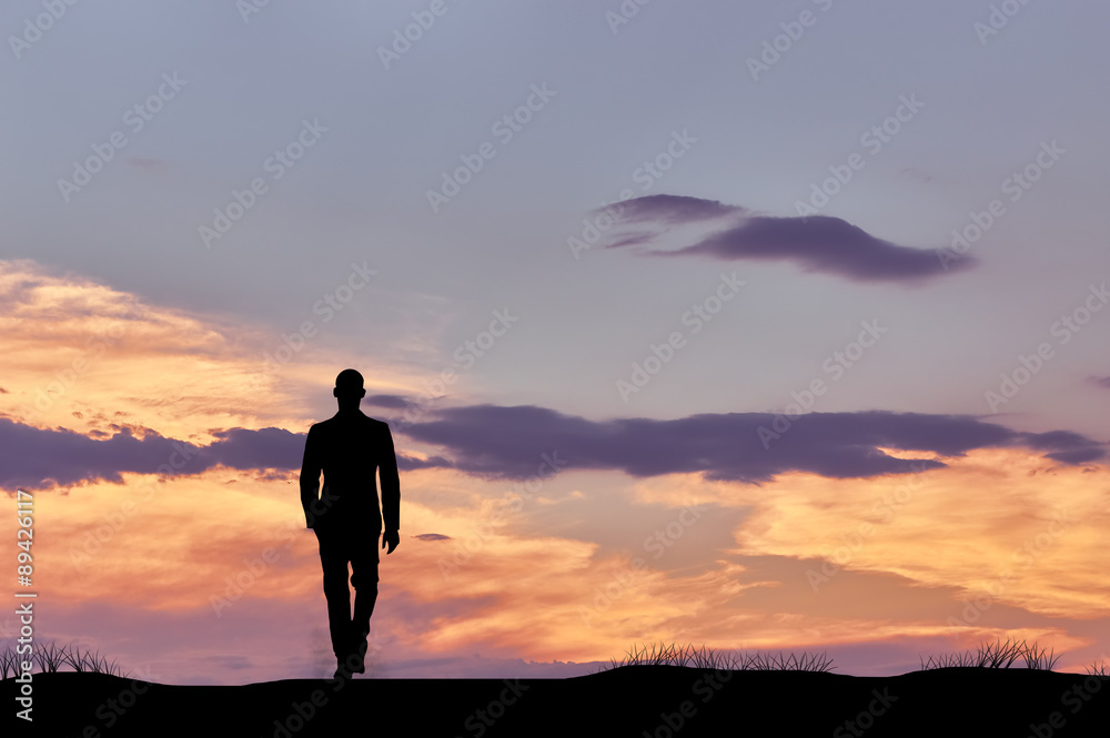 Silhouette of man walking businessman