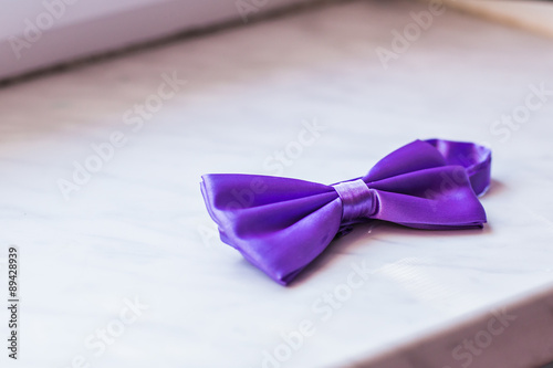 Purple bow close up 