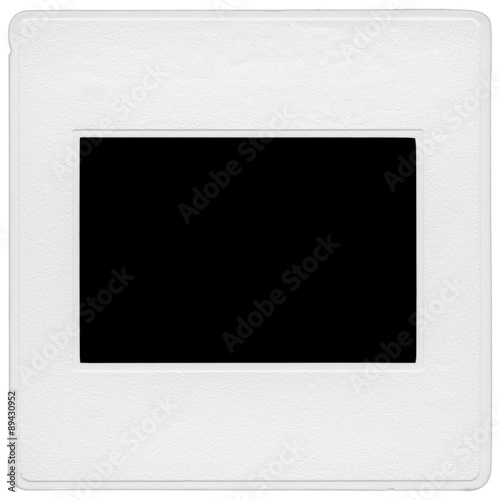 A scanned 35mm slide mount isolated on a white background. This is an actual slide mount which has been scanned. The frame is blacked out.