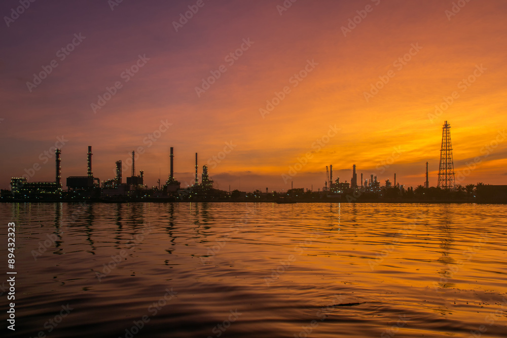 Oil refinery along the river at Dusk (Bangkok, Thailand)