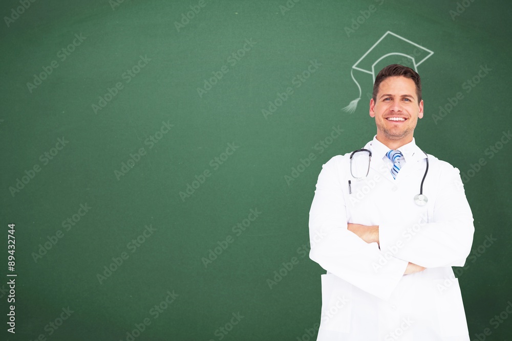 Composite image of handsome doctor with arms crossed Composite image of handsome doctor with arms crossed