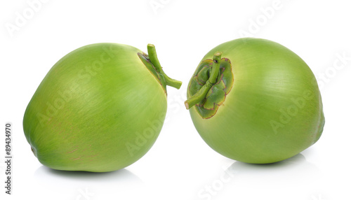 Green coconuts on white background