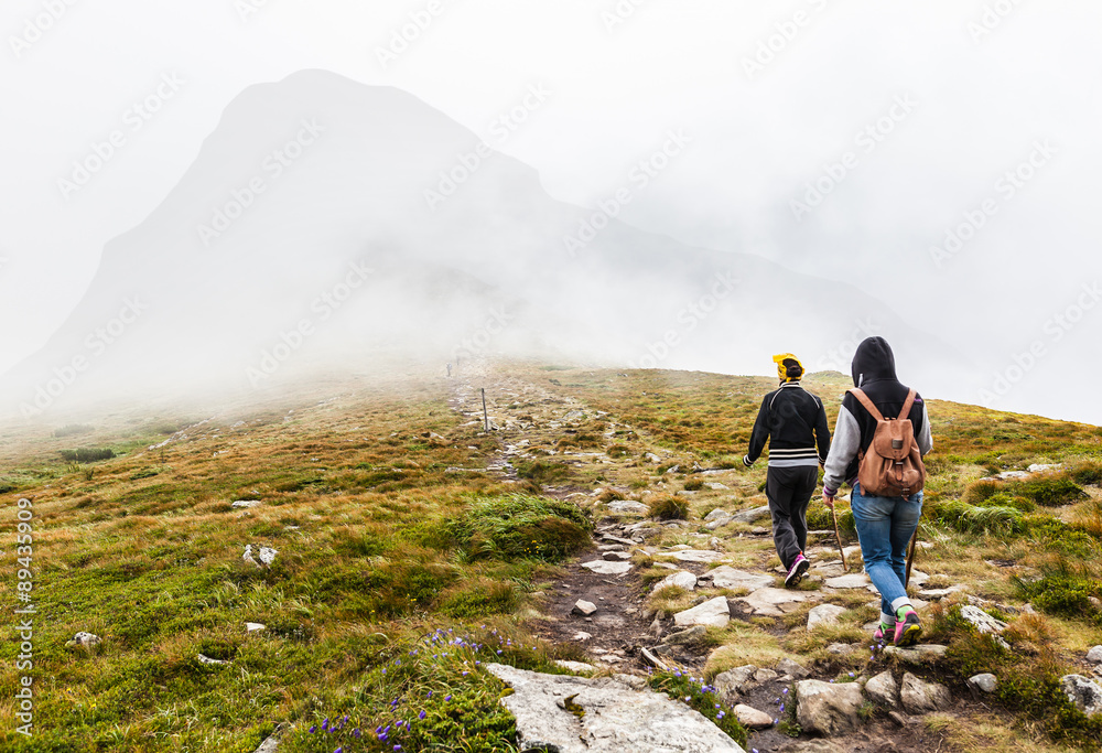 Tourists climb to the top of Hoverla