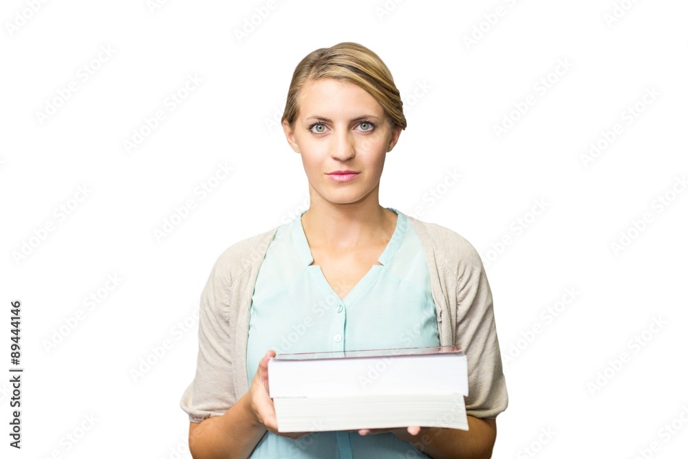 Composite image of teacher holding books Composite image of teacher holding books