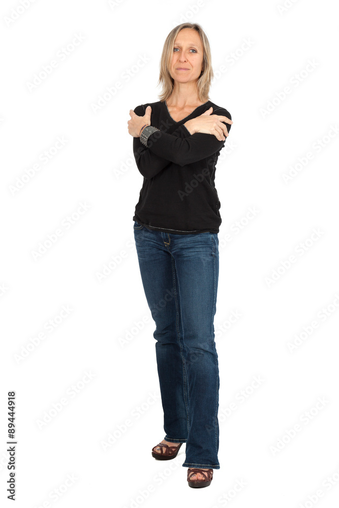 Beautiful woman doing different expressions in different sets of clothes: full length arms crossed Beautiful woman doing different expressions in different sets of clothes: full length arms crossed
