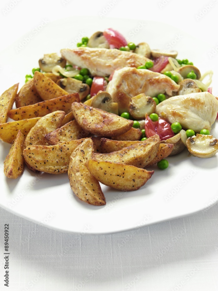 Potato wedges with chicken breast and vegetables Potato wedges with chicken breast and vegetables