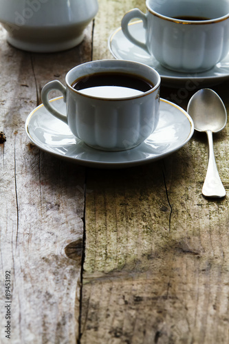 black coffee on rustic table