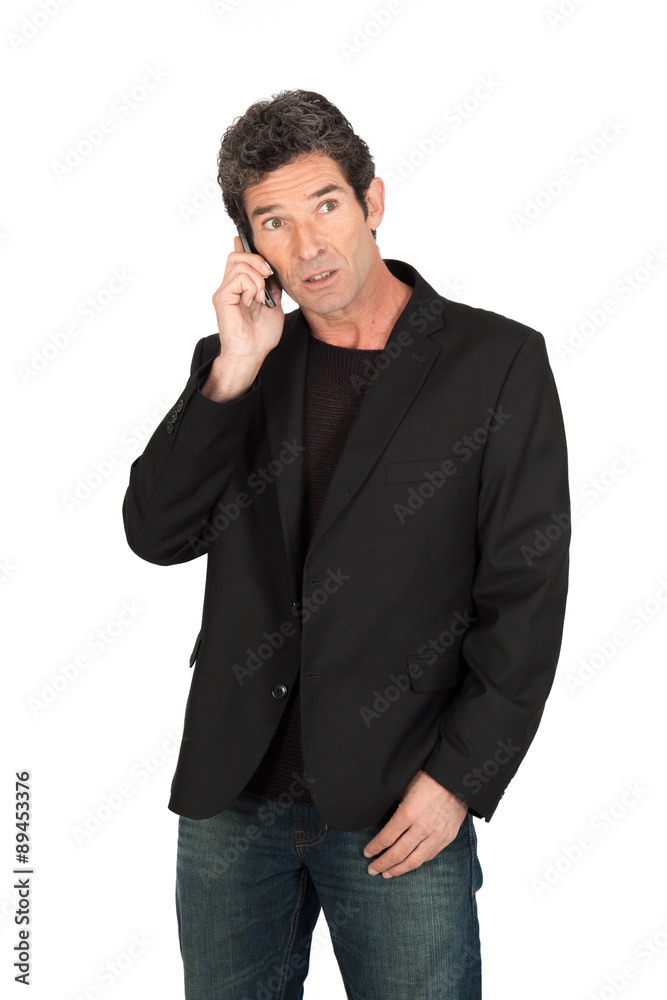 Handsome man doing different expressions in different sets of clothes: phone Handsome man doing different expressions in different sets of clothes: phone