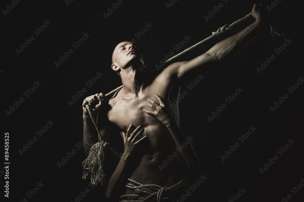 Man with rope and lady