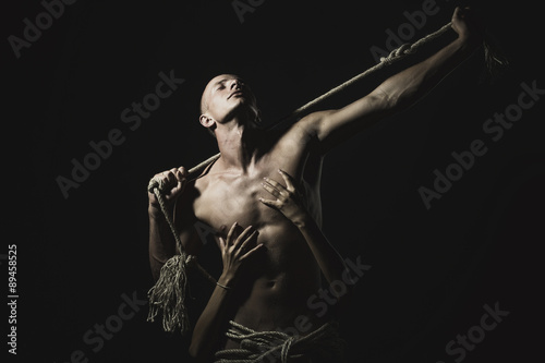 Man with rope and lady