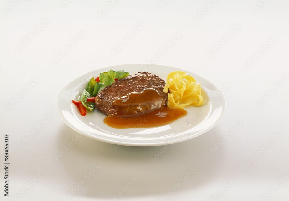 Fillet steak with gravy and ribbon pasta Fillet steak with gravy and ribbon pasta