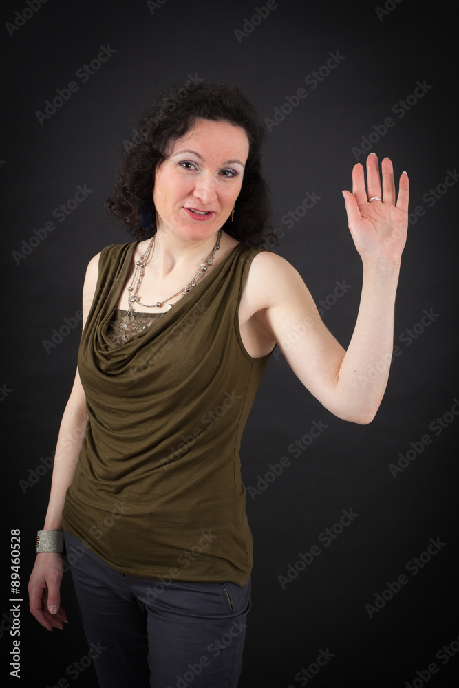 Beautiful woman doing different expressions in different sets of clothes: waving Beautiful woman doing different expressions in different sets of clothes: waving