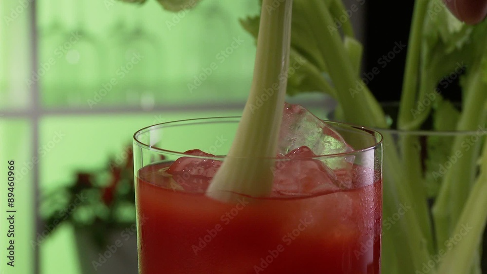 Tomato juice garnished with a stick of celery