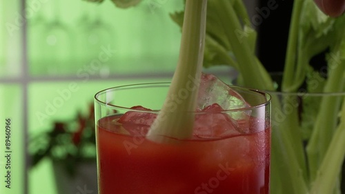 Tomato juice garnished with a stick of celery