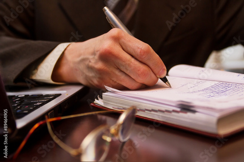 Close-up of business person hand at work