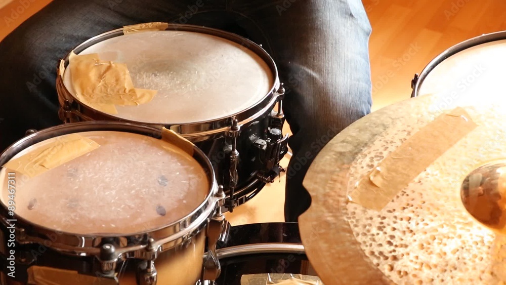 A drummer performing on his Drumset.
A drummer performing on his Drumset.
