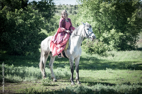 Horsewoman on white horse © sam73nz