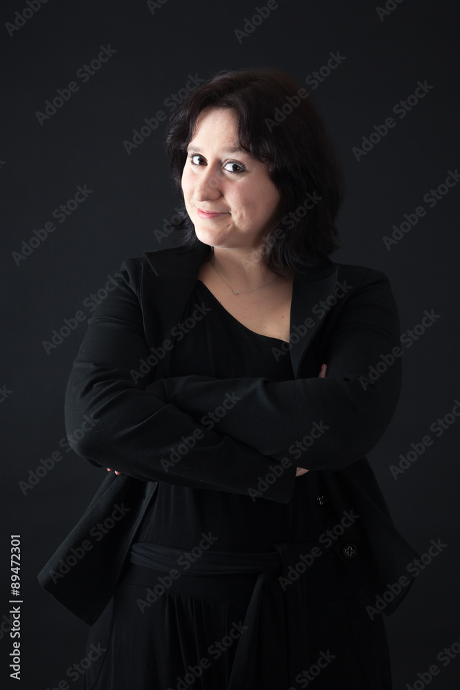 Beautiful woman doing different expressions in different sets of clothes: arms crossed Beautiful woman doing different expressions in different sets of clothes: arms crossed