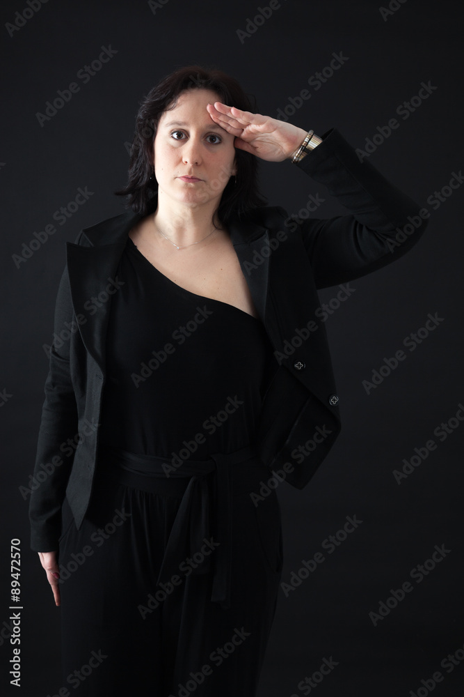 Beautiful woman doing different expressions in different sets of clothes: at attention Beautiful woman doing different expressions in different sets of clothes: at attention
