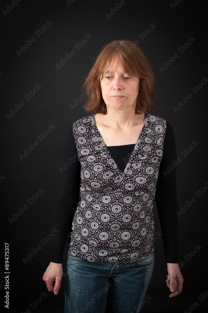 Beautiful woman doing different expressions in different sets of clothes: sad Beautiful woman doing different expressions in different sets of clothes: sad