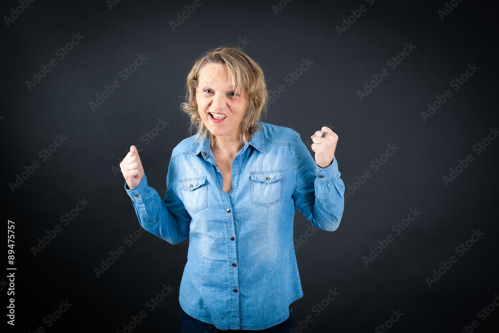 Beautiful woman doing different expressions in different sets of clothes: arms raised Beautiful woman doing different expressions in different sets of clothes: arms raised