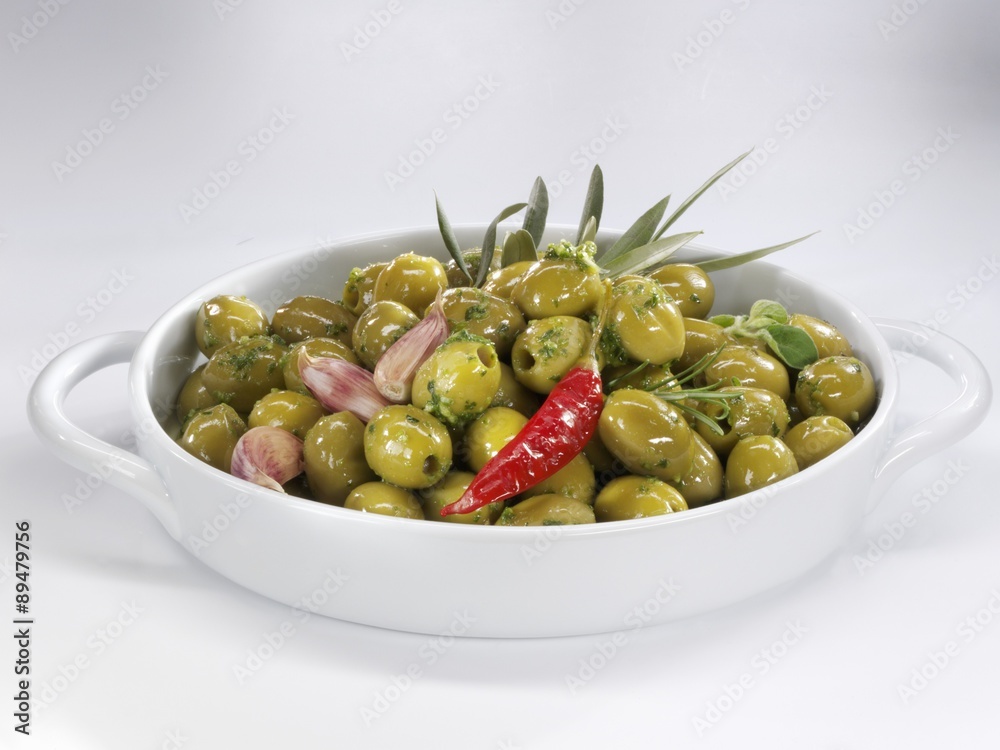 Marinated green olives with herbs, garlic and chilli Marinated green olives with herbs, garlic and chilli