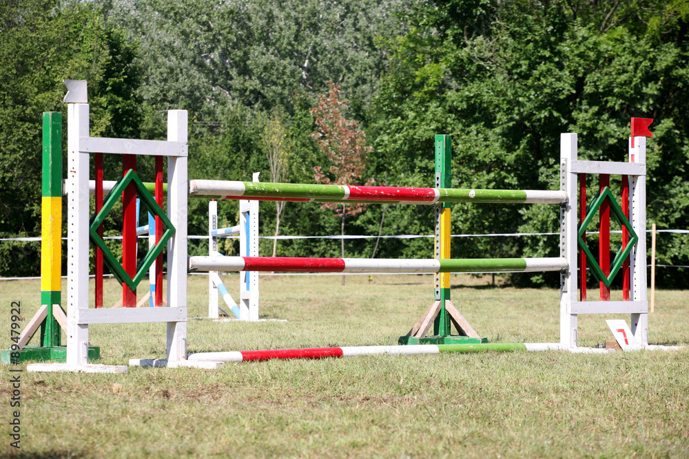 Equitation obstacles and barriers on a show jumping event Equitation obstacles and barriers on a show jumping event