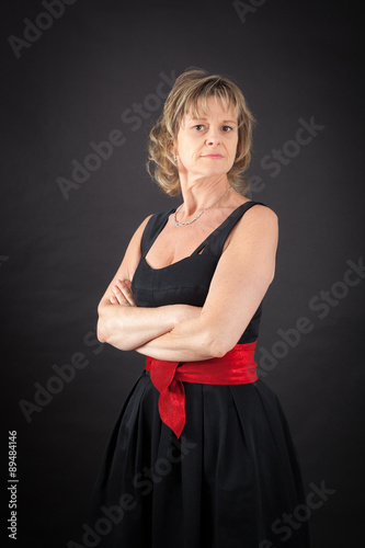 Beautiful woman doing different expressions in different sets of clothes: arms crossed