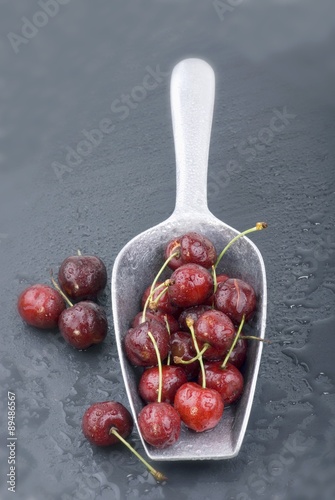 Cherries in small scoop photo