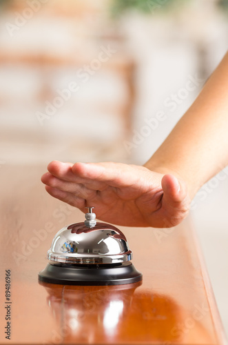 hotel bell at reception desk